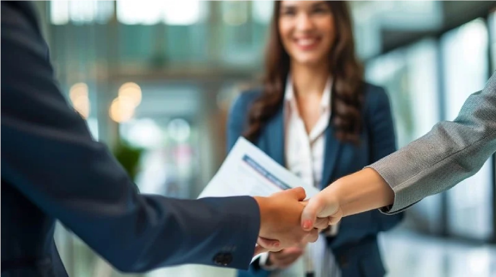 Business professionals shaking hands
